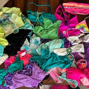Lot of 30+ pieces, mix and match swimsuits XS-L, most fit like a 4-6